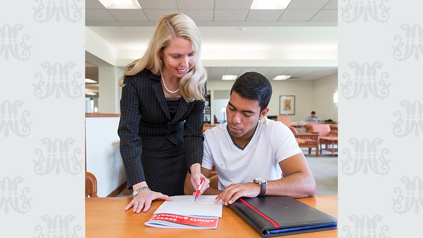 Image of Dr. Mary O. Jones working with a student on career planning.